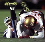 FSU Seminoles PIM 003  FSU SEMINOLES  GREG SPIRES  sacks North Carolina Tarheels OSCAR DAVENPORT during regular season conference game play. - PhotosinMotion.net. : FSU SEMINOLES  GREG SPIRES  sacks North Carolina Tarheel OSCAR DAVENPORT photo, FSU Football pictures, SPORTS photographer Tampa, COLLEGE footvall photos, FOOTBALL, North Carolina Tarheels football photos, PhotosinMotion.net